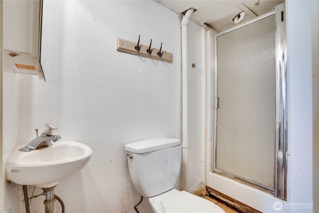 2602 Mccarver St, Tacoma, WA 98403 - full bathroom featuring a shower stall and toilet