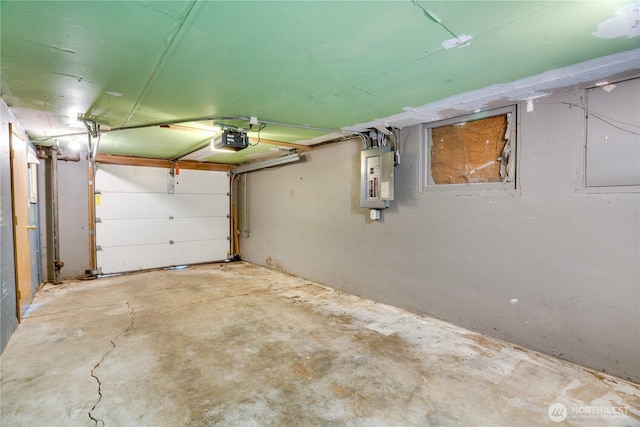 2602 Mccarver St, Tacoma, WA 98403 - garage featuring electric panel and a garage door opener
