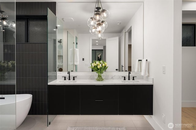 17750 SE 63rd Pl, Bellevue, WA 98006 - full bathroom with a soaking tub, double vanity, a shower, and tile patterned floors