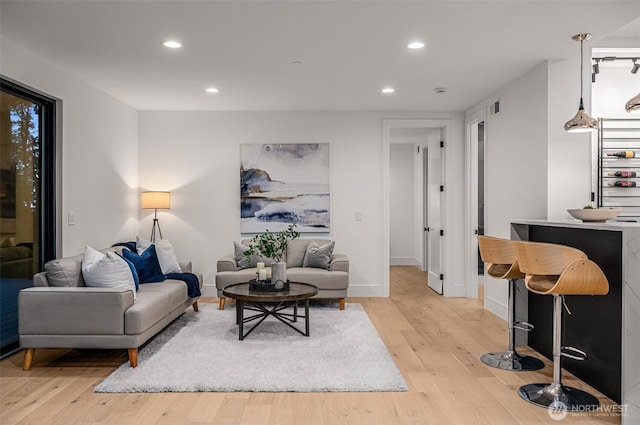 17750 SE 63rd Pl, Bellevue, WA 98006 - living room featuring light wood-type flooring and recessed lighting