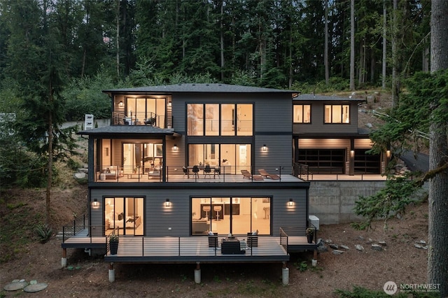 17750 SE 63rd Pl, Bellevue, WA 98006 - back of house with a balcony and a forest view
