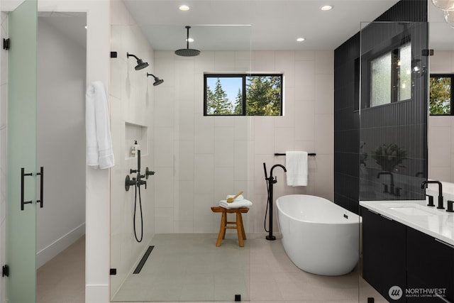 17750 SE 63rd Pl, Bellevue, WA 98006 - bathroom with tiled shower, vanity, a soaking tub, recessed lighting, and tile walls