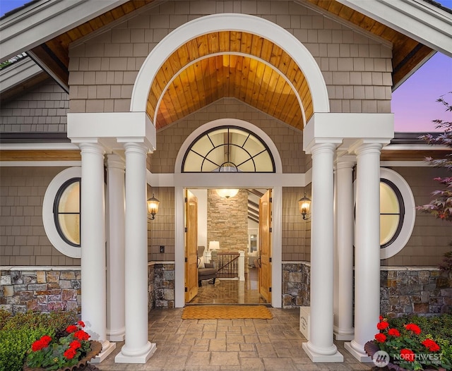 67 Cascade Ky, Bellevue, WA 98006 - view of exterior entry with stone siding and covered porch