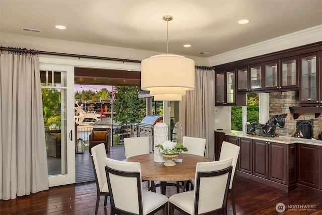 67 Cascade Ky, Bellevue, WA 98006 - dining room featuring dark wood-type flooring, plenty of natural light, recessed lighting, and ornamental molding