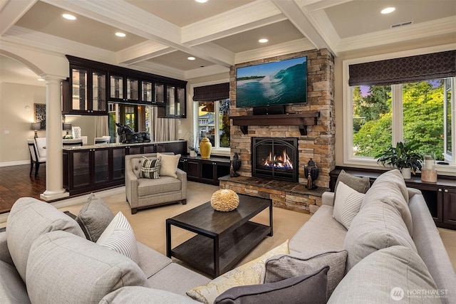 67 Cascade Ky, Bellevue, WA 98006 - living room featuring ornate columns, crown molding, coffered ceiling, healthy amount of natural light, and beamed ceiling