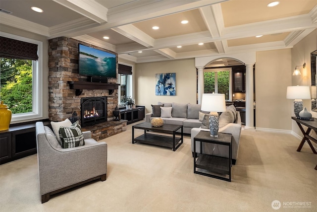 67 Cascade Ky, Bellevue, WA 98006 - living area with decorative columns, light carpet, a stone fireplace, coffered ceiling, and beamed ceiling