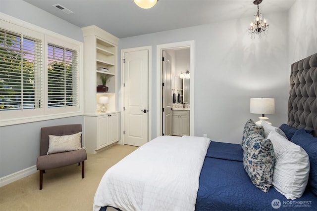 67 Cascade Ky, Bellevue, WA 98006 - bedroom featuring light colored carpet, a chandelier, and ensuite bathroom