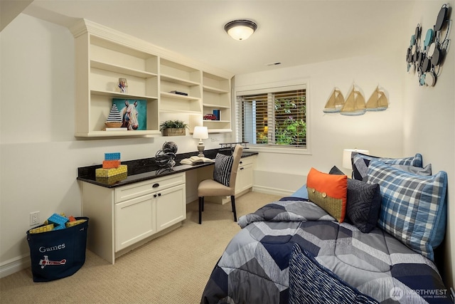 67 Cascade Ky, Bellevue, WA 98006 - bedroom featuring built in study area and light carpet