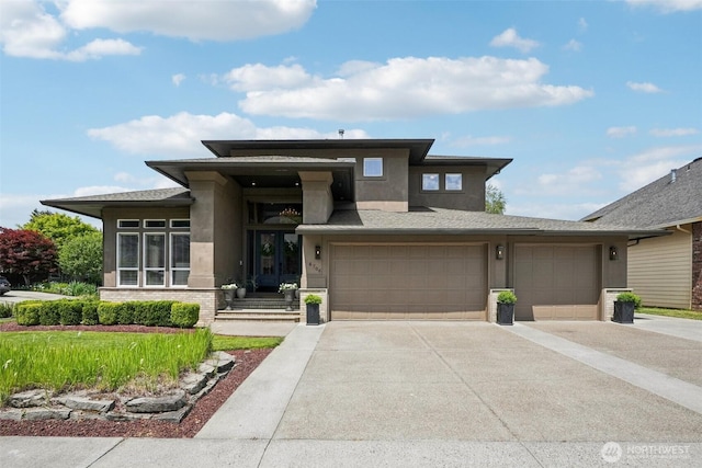 4706 NE 137th St NE, Vancouver, WA 98686 - prairie-style home with concrete driveway, stucco siding, and an attached garage