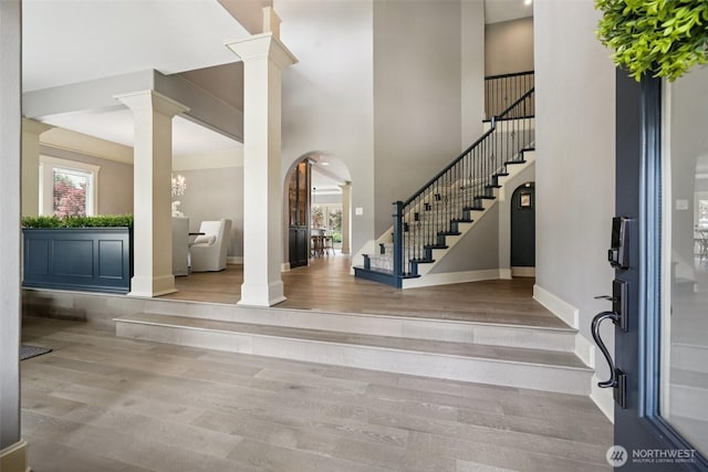 4706 NE 137th St NE, Vancouver, WA 98686 - entrance foyer with stairs, wood finished floors, plenty of natural light, ornate columns, and a towering ceiling