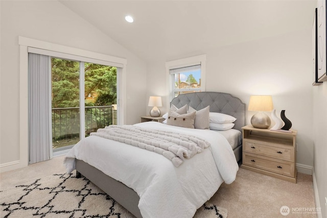 5235 11th Ave NE Unit A, Seattle, WA 98105 - bedroom featuring access to outside, light colored carpet, vaulted ceiling, multiple windows, and recessed lighting