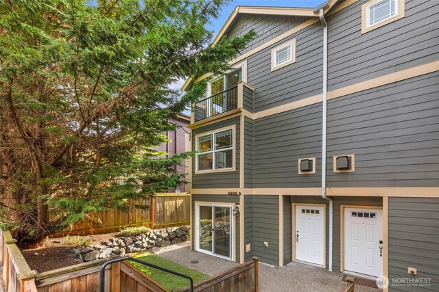 5235 11th Ave NE Unit A, Seattle, WA 98105 - back of house featuring a balcony
