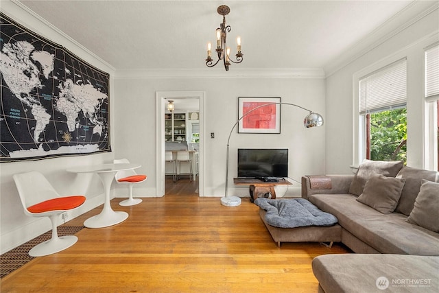 4228 1st Ave NE, Seattle, WA 98105 - living room with wood finished floors, a chandelier, and crown molding