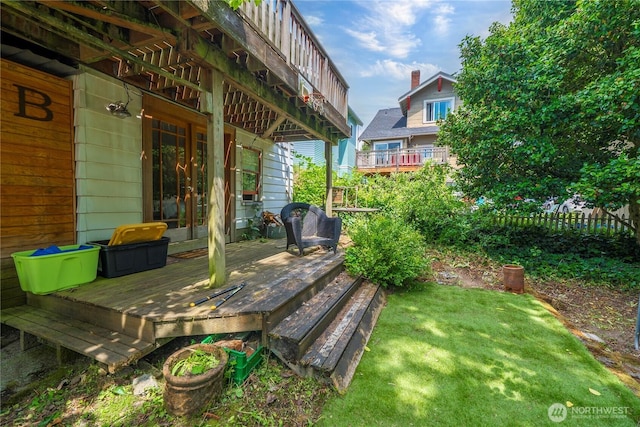 4228 1st Ave NE, Seattle, WA 98105 - view of green lawn with french doors and a wooden deck
