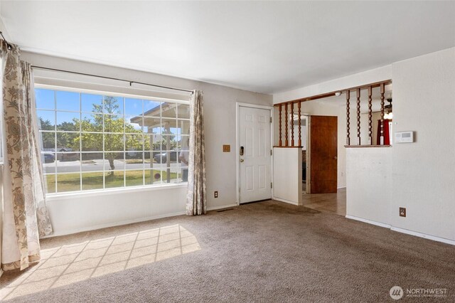 832 S 2nd Ave, Othello, WA 99344 - empty room with carpet floors and baseboards