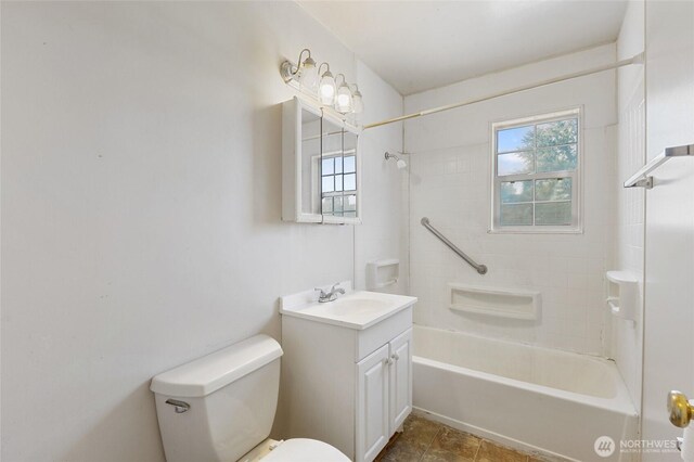 832 S 2nd Ave, Othello, WA 99344 - full bathroom featuring vanity, plenty of natural light, and tub / shower combination