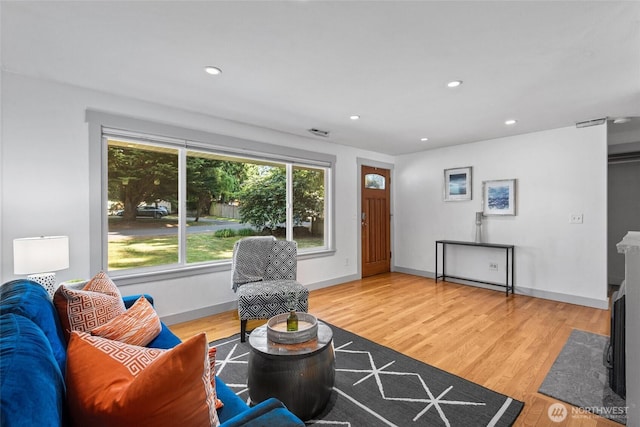 19515 7th Ave NE, Shoreline, WA 98155 - living area featuring wood finished floors and recessed lighting