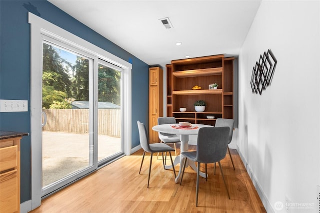 19515 7th Ave NE, Shoreline, WA 98155 - dining space featuring light wood-style floors and recessed lighting