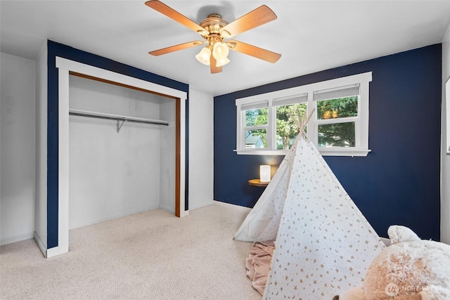 19515 7th Ave NE, Shoreline, WA 98155 - bedroom with carpet floors, a closet, and a ceiling fan