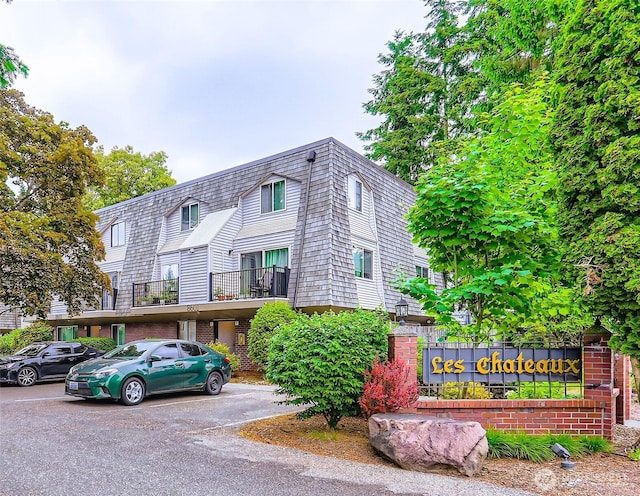 8605 244th St SW Unit 3F, Edmonds, WA 98026 - view of building exterior with covered parking