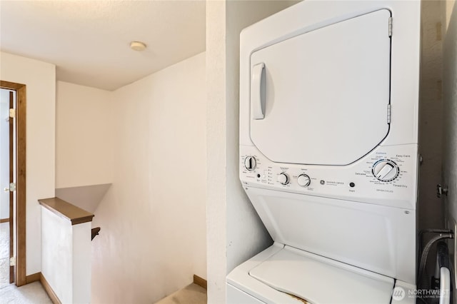 8605 244th St SW Unit 3F, Edmonds, WA 98026 - washroom featuring stacked washing machine and dryer