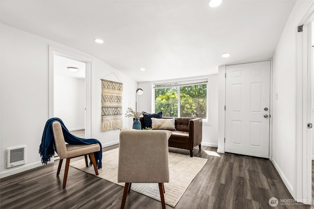 4952 12th Ave S, Seattle, WA 98108 - living room featuring dark wood-style floors, recessed lighting, heating unit, and lofted ceiling