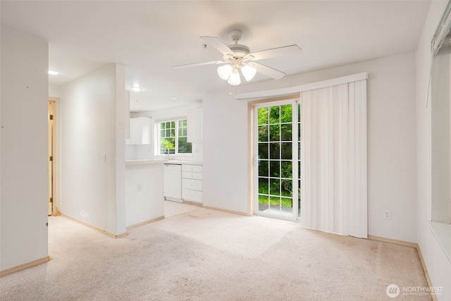 1160 Monroe Ave NE Unit B-4, Renton, WA 98056 - empty room with a ceiling fan and recessed lighting