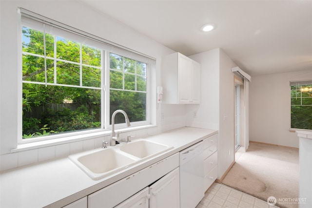 1160 Monroe Ave NE Unit B-4, Renton, WA 98056 - kitchen featuring white dishwasher, white cabinets, light countertops, and recessed lighting