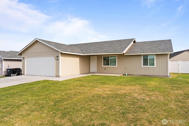1325 W Polo Ridge Dr, Moses Lake, WA 98837 - ranch-style house featuring an attached garage, driveway, and a shingled roof