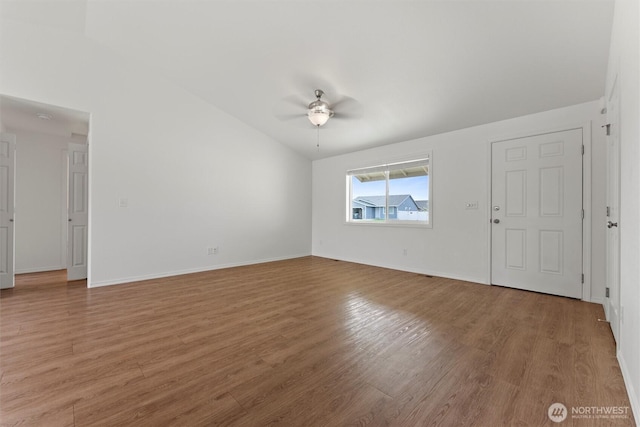 1325 W Polo Ridge Dr, Moses Lake, WA 98837 - unfurnished living room with ceiling fan and light wood-style flooring