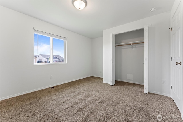 1325 W Polo Ridge Dr, Moses Lake, WA 98837 - unfurnished bedroom featuring carpet flooring and a closet