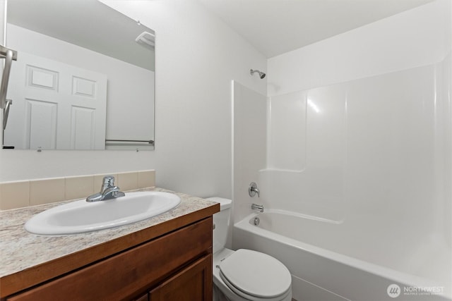 1325 W Polo Ridge Dr, Moses Lake, WA 98837 - full bathroom featuring shower / bath combination, vanity, and backsplash