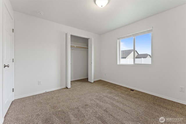 1325 W Polo Ridge Dr, Moses Lake, WA 98837 - unfurnished bedroom with carpet and a closet