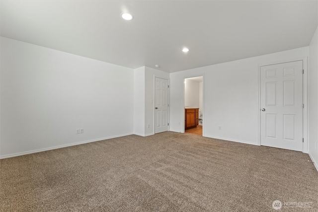 1325 W Polo Ridge Dr, Moses Lake, WA 98837 - unfurnished bedroom featuring carpet, recessed lighting, and connected bathroom