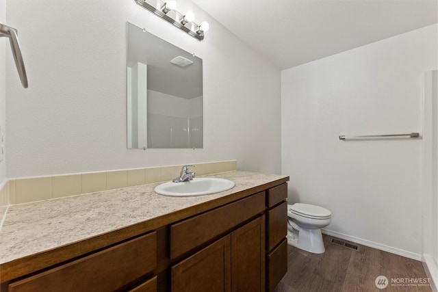 1325 W Polo Ridge Dr, Moses Lake, WA 98837 - bathroom featuring vanity and wood finished floors
