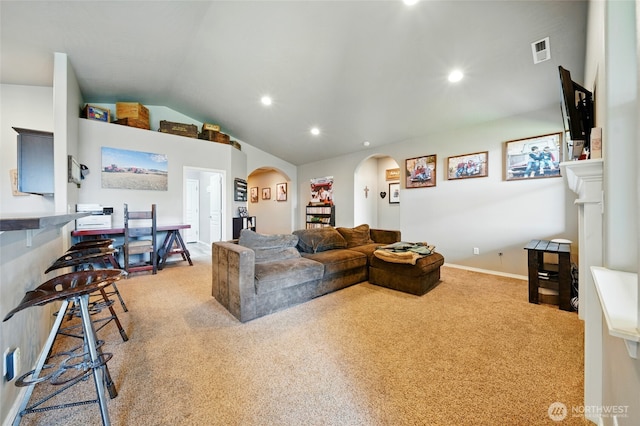 2134 Alco Ave, Walla Walla, WA 99362 - carpeted living area featuring arched walkways, lofted ceiling, and recessed lighting