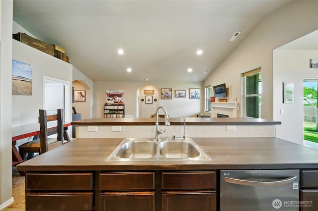 2134 Alco Ave, Walla Walla, WA 99362 - kitchen with dishwasher, recessed lighting, dark brown cabinets, lofted ceiling, and a fireplace
