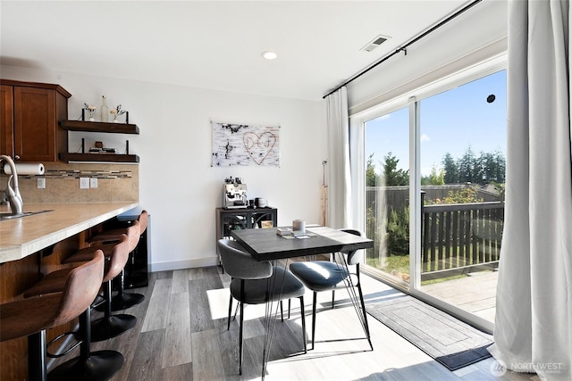 6672 Udall Pl SE, Auburn, WA 98092 - dining room with light wood-style floors and recessed lighting
