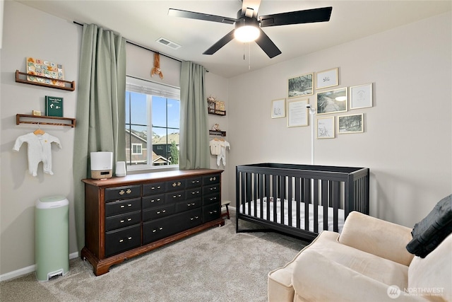 6672 Udall Pl SE, Auburn, WA 98092 - bedroom with light carpet, a nursery area, and ceiling fan