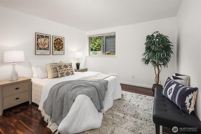 4727 W Lake Sammamish Pkwy SE Unit B-106, Issaquah, WA 98027 - bedroom featuring wood finished floors and baseboards