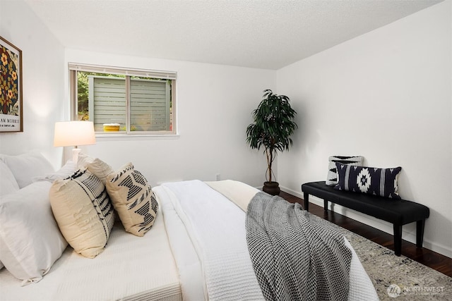 4727 W Lake Sammamish Pkwy SE Unit B-106, Issaquah, WA 98027 - bedroom with wood finished floors and baseboards