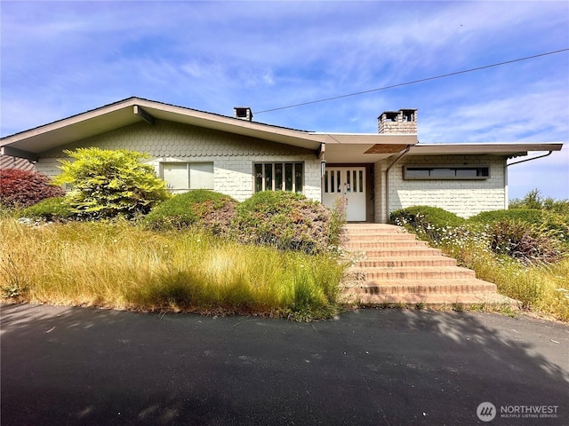 1445 SW 296th St, Federal Way, WA 98023 - view of front facade featuring a chimney