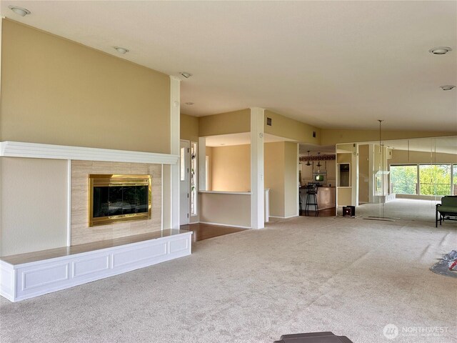 1445 SW 296th St, Federal Way, WA 98023 - unfurnished living room with carpet flooring and a tile fireplace