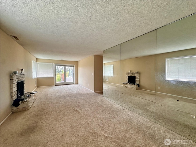 1445 SW 296th St, Federal Way, WA 98023 - unfurnished living room with a fireplace, carpet, and a textured ceiling
