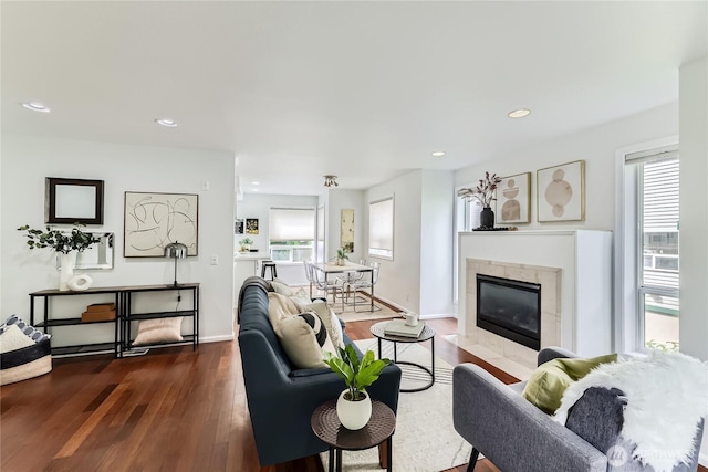 2801 NE 130th St Unit C101, Seattle, WA 98125 - living room featuring dark wood-type flooring, a tiled fireplace, and recessed lighting