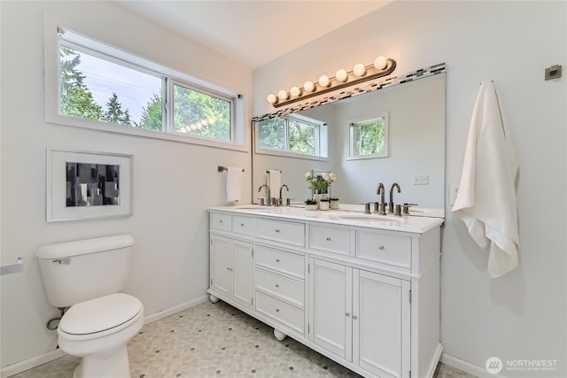 2801 NE 130th St Unit C101, Seattle, WA 98125 - bathroom with double vanity and toilet
