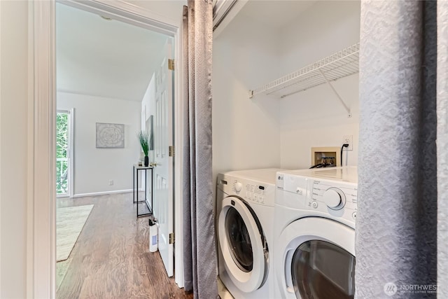 2801 NE 130th St Unit C101, Seattle, WA 98125 - laundry area featuring washing machine and clothes dryer and wood finished floors