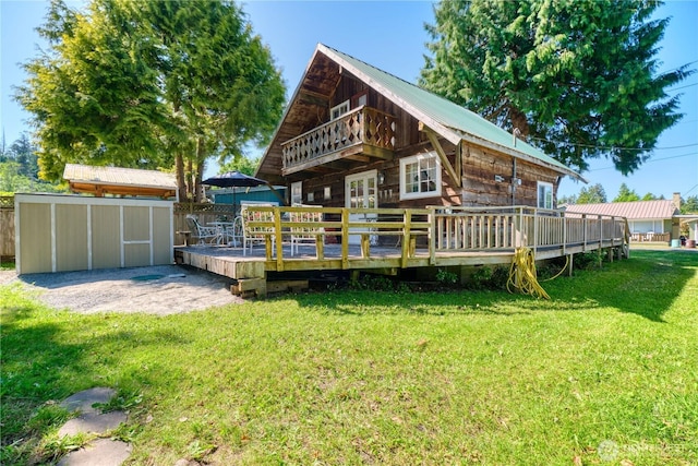 2111 Maple St, Point Roberts, WA 98281 - back of property featuring a wooden deck, a balcony, and a metal roof