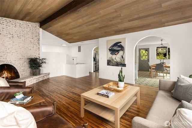10376 NE Winthers Rd, Bainbridge Island, WA 98110 - living room with arched walkways, wood finished floors, and wood ceiling