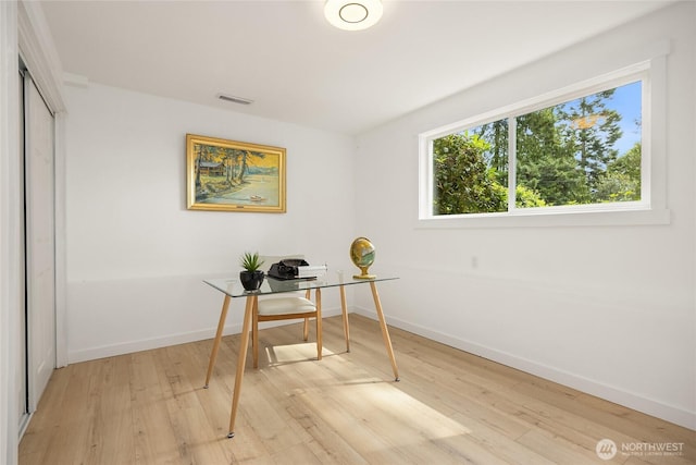 10376 NE Winthers Rd, Bainbridge Island, WA 98110 - office space featuring light wood-style flooring and baseboards
